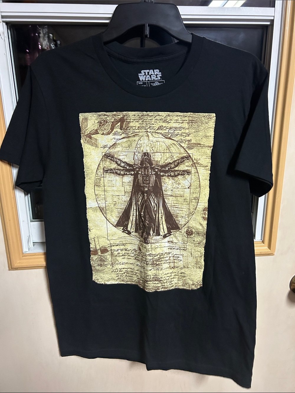Star Wars Men’s with Gold Vitruvian Vader Graphic Black Tee
